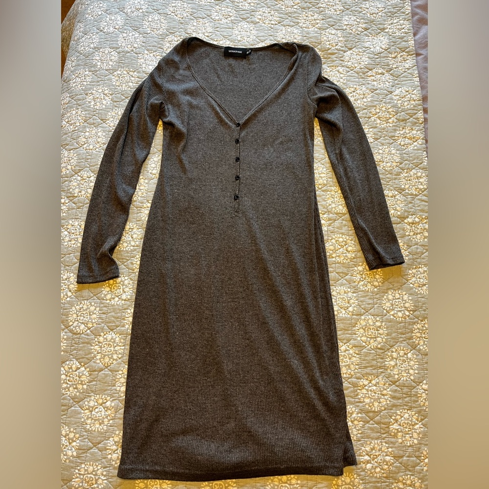 Cozy sweater dress. Low cut, can be dressed up